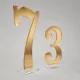 Złote lustrzane numerki 7 i 3 na stoły weselne